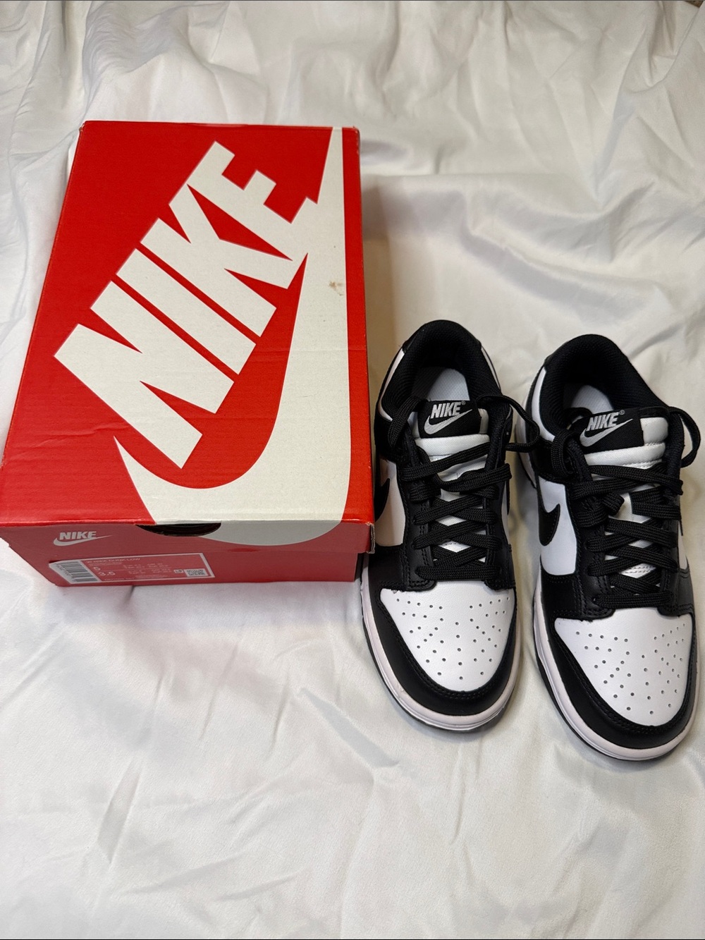 Nike Women’s Black and White Dunk Low Pandas